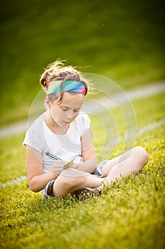 Little girl writing