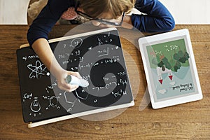 Little Girl Writing Blackboard Concept