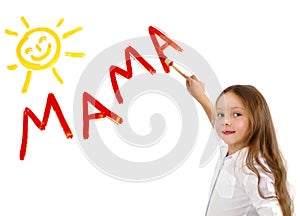 Little girl writing word Mama photo