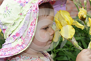 Little girl with yellow flower