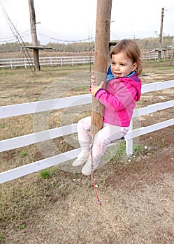 Little girl on a zipline