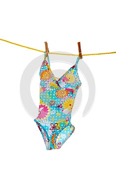 Little girls bathing suit on clothes line