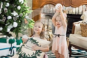 Little girls on Christmas background