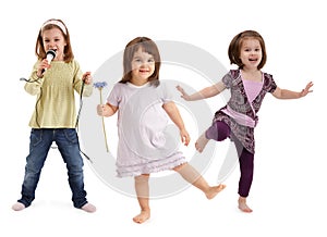 Little girls dancing having fun photo
