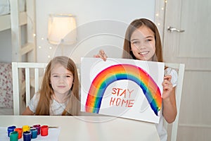 Little girls write stay home. flashmob. rainbow photo