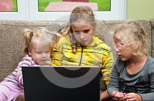 Little girls and laptop