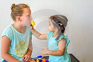 Little Girls Playing Doctor.