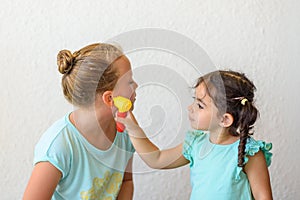 Little Girls Playing Doctor.