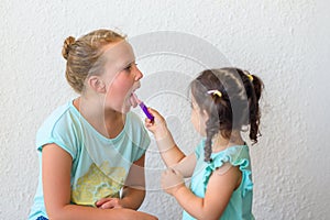 Little Girls Playing Doctor.