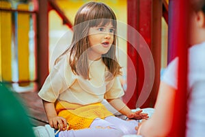 Little Girls Playing Together Nicely at the Playground