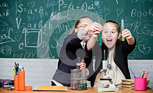 Little girls in school lab. Chemistry education. Little scientist work with microscope. Chemistry research. Biology
