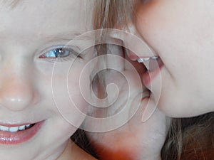 Little Girls Telling Secrets Whispering Twin Sisters photo