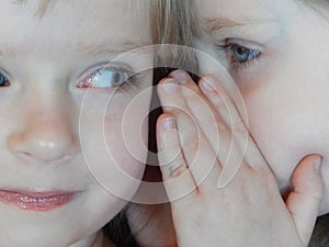 Little Girls Telling Secrets Whispering Twin Sisters photo