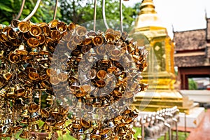 Little golden bells hang in Wat Phra Singh Woramahawihan temple, Chiang Mai, Thailand