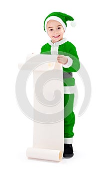 Little green Santa Claus boy showing wish list