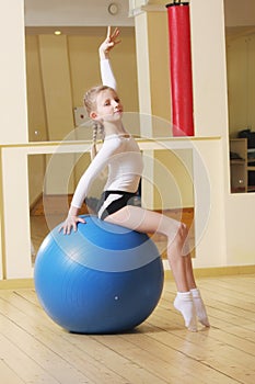 Little gymnast on ball