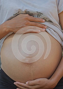 Little hand of sleeping baby newborn close up