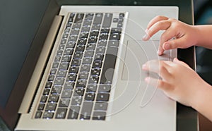 Little hand touch on touch pad notebook