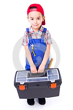 Little handyman carrying toolbox