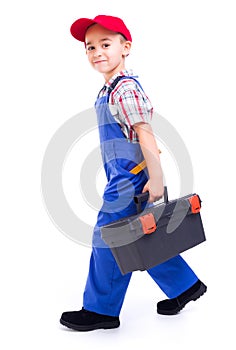 Little handyman carrying toolbox