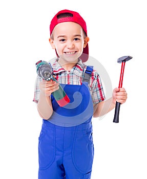 Little handyman with drill and hammer