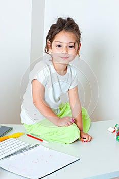 little happy girl in computer science class