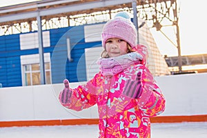 Little happy girl skating