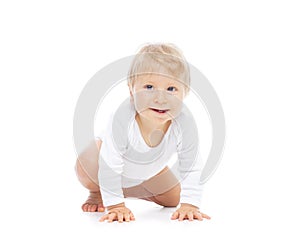 Little, happy and smiling cute baby in the studio. Portrait of a one year old baby. The concept of happiness.