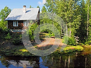 Little house in birch forest