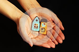 Little houses in hands