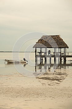 little hut along the coast line at low tide