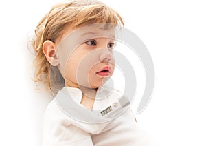 Little ill kid with electronic thermometer