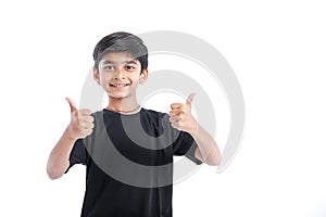 little Indian / Asian boy showing thumbs up