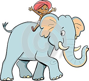little Indian boy riding on an elephant