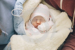 Little infant newborn child in maternity hospital on his fathers