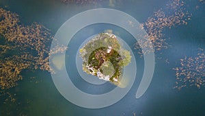 Little island in the lake Croda da Lago. Cortina D`Ampezzo, Dolo