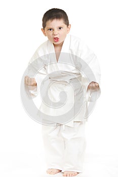 Little karate kid in threatening pose