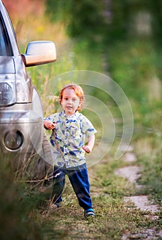 little kid  big car  nature summer