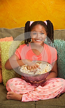 Little Kid Eats Popcorn