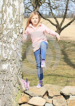 Little kid - girl kicking off her shoe