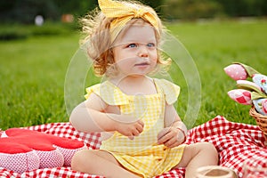 Little kid on picnic in park