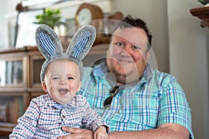Little kid wearing bunny ears on Easter