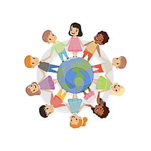 Little kids of different nationalities standing and holding hands around the Earth globe, friendship, unity concept photo