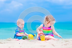 Little kids playing on the beach