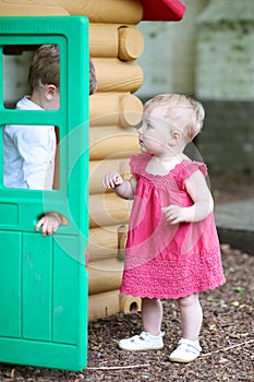 Little kids playing outdoors