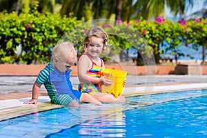 Little kids in swimming pool