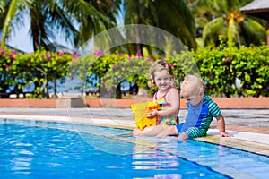 Little kids in swimming pool