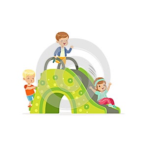 Little kids, two boys and girl playing on colorful slide at playground. Cartoon flat children characters