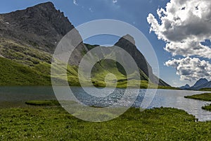 Little lake with mountains