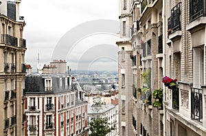 A little landscape of Paris, through the historical buildings in Montmartre photo